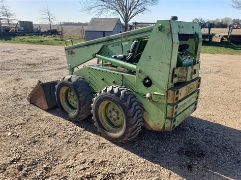 mustang 1200 skid steer|OMC .